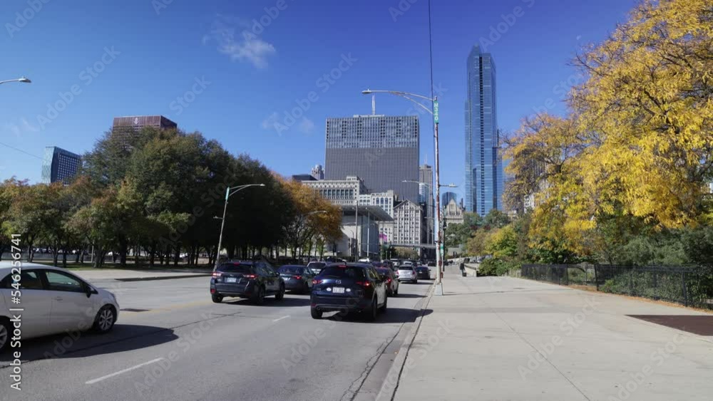 Timelpase of Chicago, Illinois street with cars and pedestrians. Timelpase of Chicago, Illinois street with cars and pedestrians.