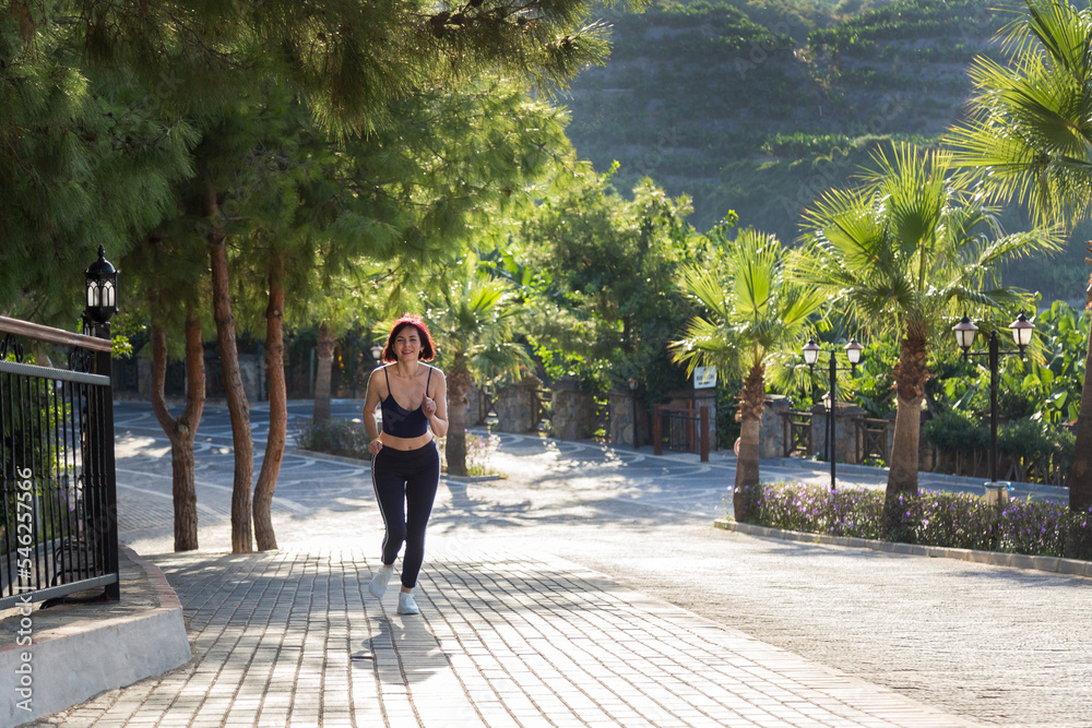 Woman morning jog through beautiful scenery.