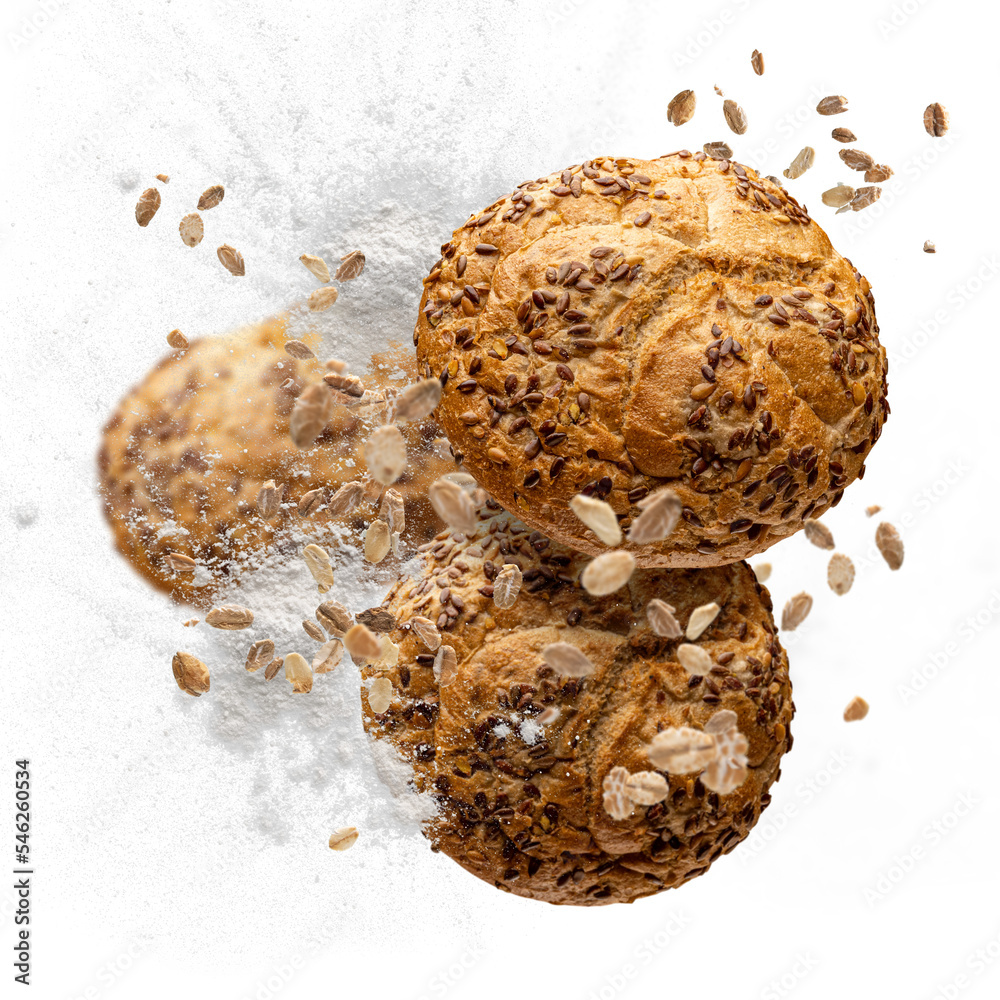Delicious grain baking flying in air. Bakery products concept - obrazy, fototapety, plakaty 