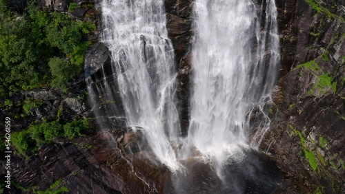 Wonderful landscapes in Norway. Hordaland. Beautiful scenery of Skjervsfossen waterfall from the Storelvi river on the Hardanger scenic route. photo