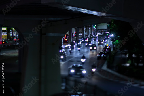 A night miniature traffic jam at the urban street in Tokyo