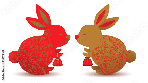 Little rabbit rad and gold holding a lucky bag.
