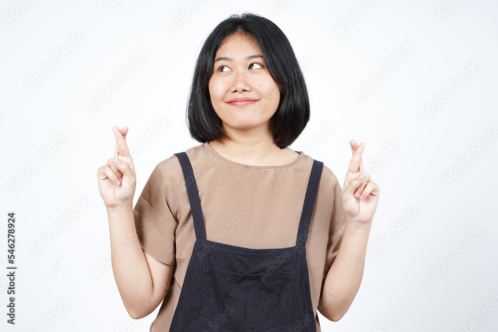 Crossing Finger or Lucky Finger Gesture Of Beautiful Asian Woman Isolated On White Background Crossing Finger or Lucky Finger Gesture Of Beautiful Asian Woman Isolated On White Background