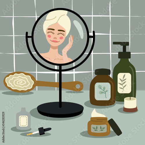 Girl look at the mirrow and skincare. Cosmetic bottles elements. Bath room and beauty table. 