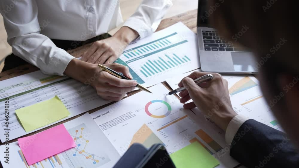 Asian business adviser meeting to analyze and discuss the situation on the financial report in the meeting room.Investment Consultant,Financial Consultant,Financial advisor and accounting concept