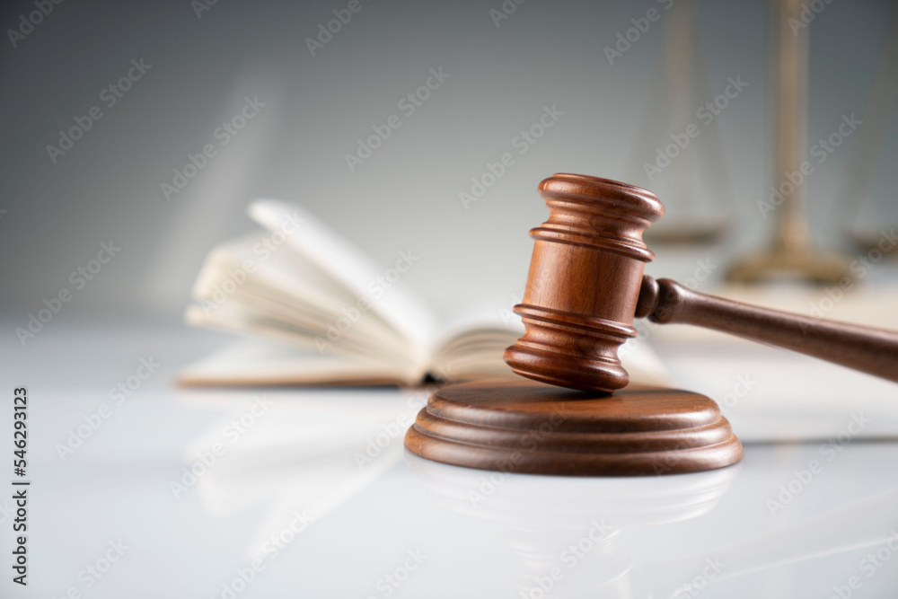 Law and justice concept. Judge office – gavel and legal code on white desk. Law and justice concept. Judge office – gavel and legal code on white desk.