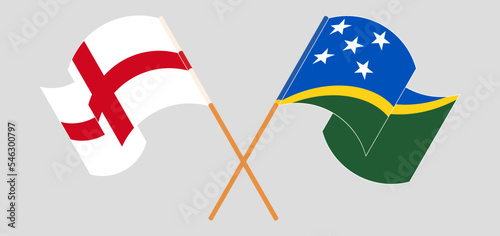 Crossed and waving flags of England and Solomon Islands