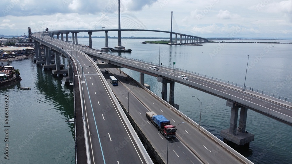 Aerial shot of the Cebu Cordova Bridge (CCLEX) full of cars, Mactan island