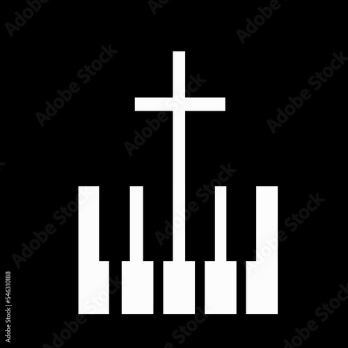 cross on the background of piano keys