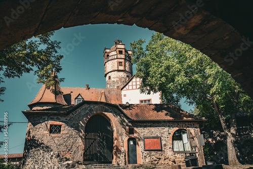 View of the Medieval Castle of Ronneburg in Germany depicted from a low angle at an arch photo