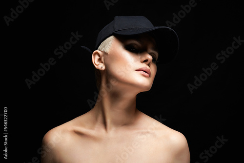 Short Hair Beautiful young woman in Hat. sensual blond girl with make-up