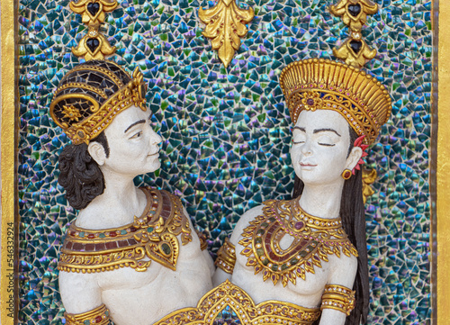 Figurative decoration on the wall of a Buddhist temple Wat Pariwat, Bangkok, Thailand