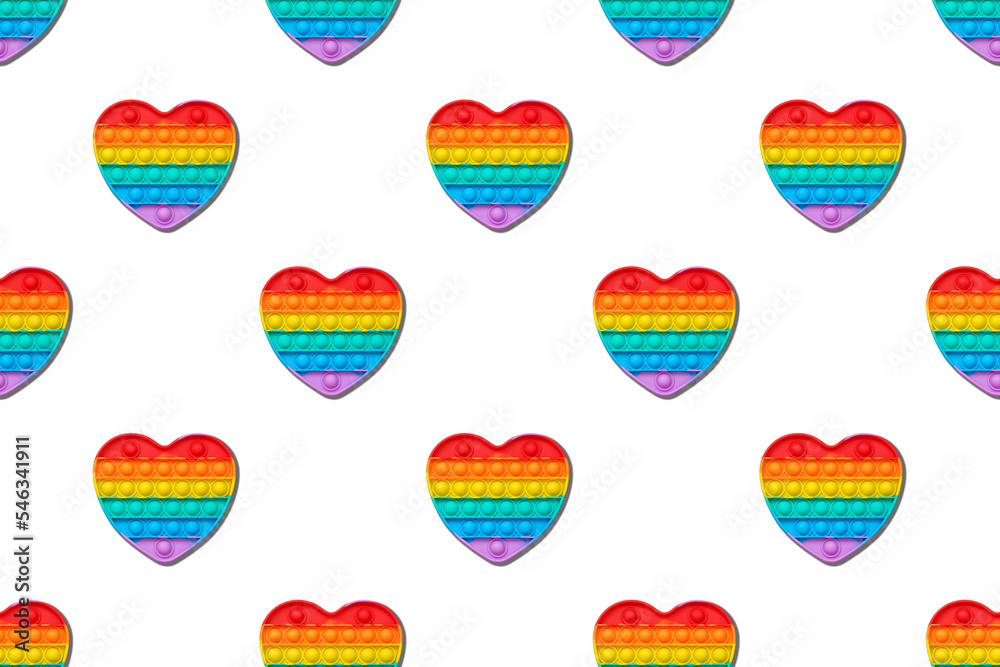 Rainbow Pop in the shape of a heart on a white backgro Rainbow Pop in the shape of a heart on a white backgro