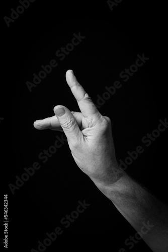 Hand demonstrating the Arabic sign language letter 'ظ' or 'Thah'