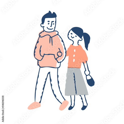 腕を組んで歩く若いカップル
