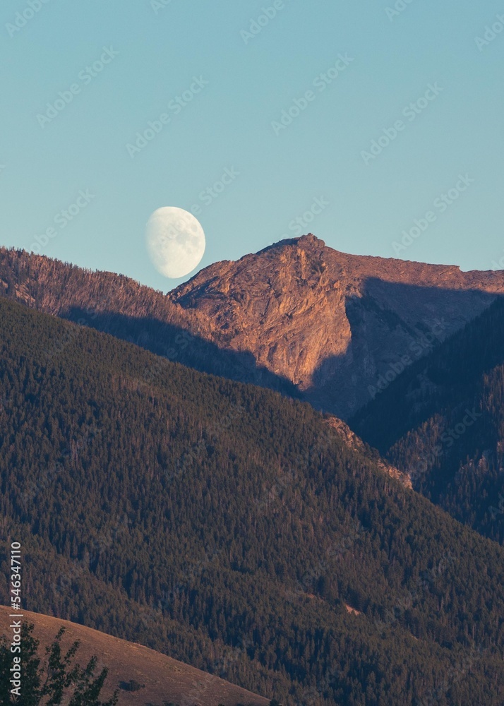 moonrise over the mountains north of yellowstone