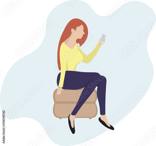 A young girl looks at the phone