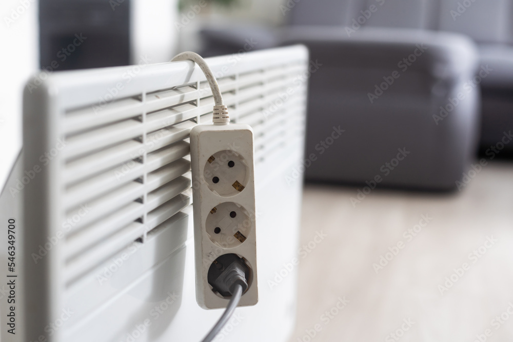 electric heater and extension cord. electric heater and extension cord.
