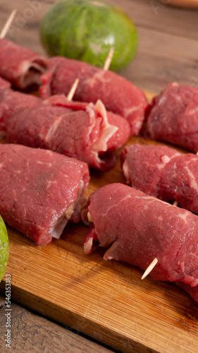 close-up of raw meat on a cutting board