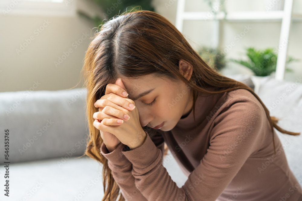 Believe faith charity, calm asian young woman show gratitude, folded hands in prayer feel grateful, meditating with her eyes closed, praying to request God for help. Religious, forgiveness concept. Believe faith charity, calm asian young woman show gratitude, folded hands in prayer feel grateful, meditating with her eyes closed, praying to request God for help. Religious, forgiveness concept.