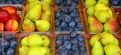 Fresh Fruit in farmer market. Various colorful fresh fruits on stall.