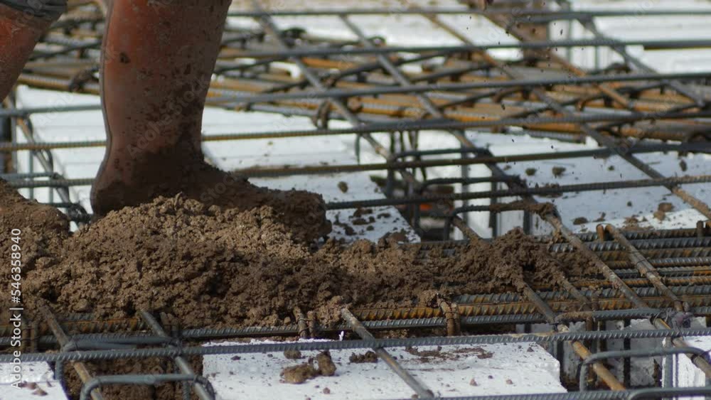 Pouring concrete mix on a concreting formwork. Forming, an essential