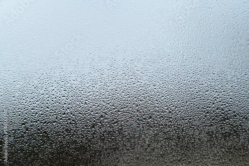 Canvastavla large dew drops on the window after condensation has settled on the window