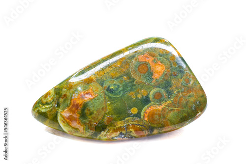 Close-up macro opaque tumbled ocean jasper, smooth colorful chalcedony crystal stone isolated on a white background surface photo