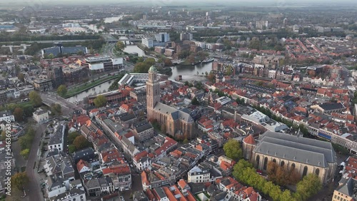 Zwolle old historic city center and city walls overhead skyline. Canal around city with rich history, Pepperbus church tower, Sassenpoort, Onze Lieve Vrouwebasiliek aerial. photo