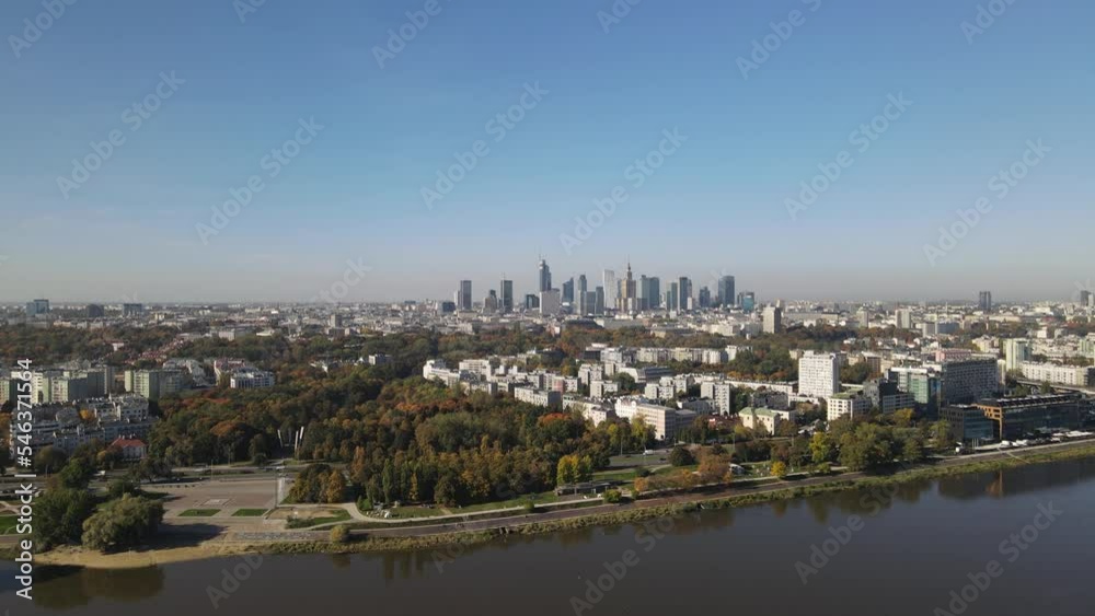Aerial view on a sunny ,autumn day on the center of Warsaw ,skyscrapers ,financial centers and the Vistula River and bridges on it. Aerial view on a sunny ,autumn day on the center of Warsaw ,skyscrapers ,financial centers and the Vistula River and bridges on it.