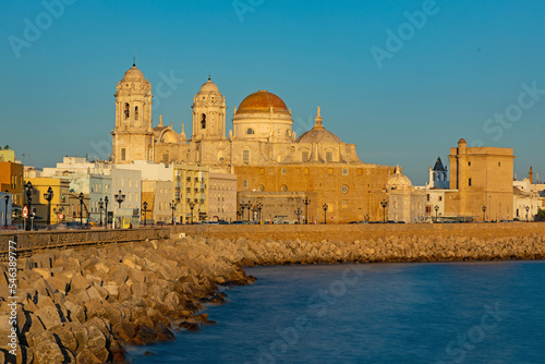 seafront in Cadiz with view to the cathedral in the golden hour