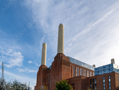 Chimneys and brick facade of iconic London landmark Battersea Power Station and surrounding area. photo