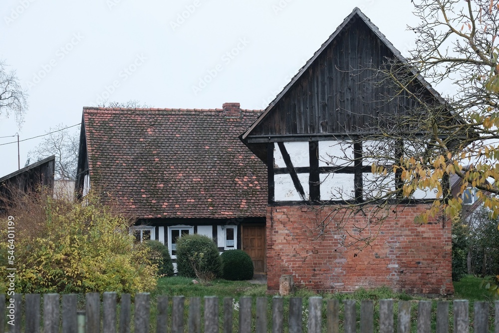 Obraz premium Half-timbered buildings in Swolowo on Polish central Pomerania, near Slupsk, Poland. Swolowo is a village known for its half-timbered buildings (Prussian wall)