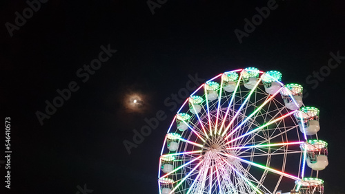 ferris wheel on the background of the night sky