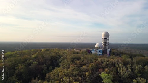 wooded mountain with tower dome roof. Tranquil aerial view flight berlin germany photo