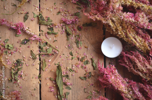 Dead Celosia Flowers with a Candle on a Rustic Wood Background | Romantic Dead Flowers | Candles with Flowers