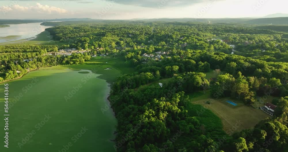 June 29, 2022 Afternoon summer aerial drone video of the area around Saugerties New York, USA. June 29, 2022 Afternoon summer aerial drone video of the area around Saugerties New York, USA.