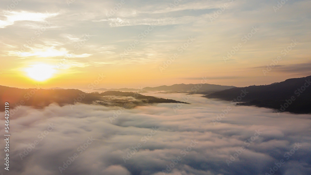 Thick fog in the mountains at dawn, Beautiful sunrise and fog landscape. Thick fog in the mountains at dawn, Beautiful sunrise and fog landscape.