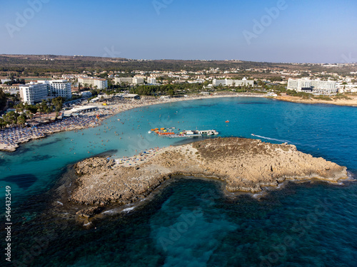 Fototapeta Naklejka Na Ścianę i Meble -  Aerial panoramic view on blue crystal clear water on Mediterranean sea near Nissi beach, Ayia Napa, Cyprus