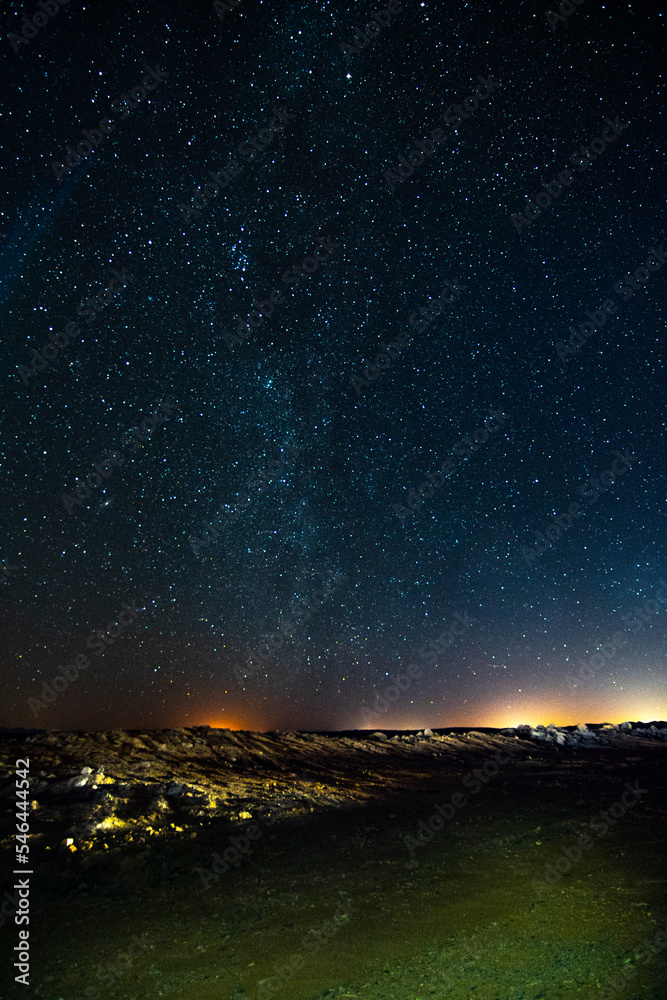 Hail, Medina, Saudi Arabia. February 1st, 2022. A night shots on the highway. Long exposure photo that shows night lights and stars.