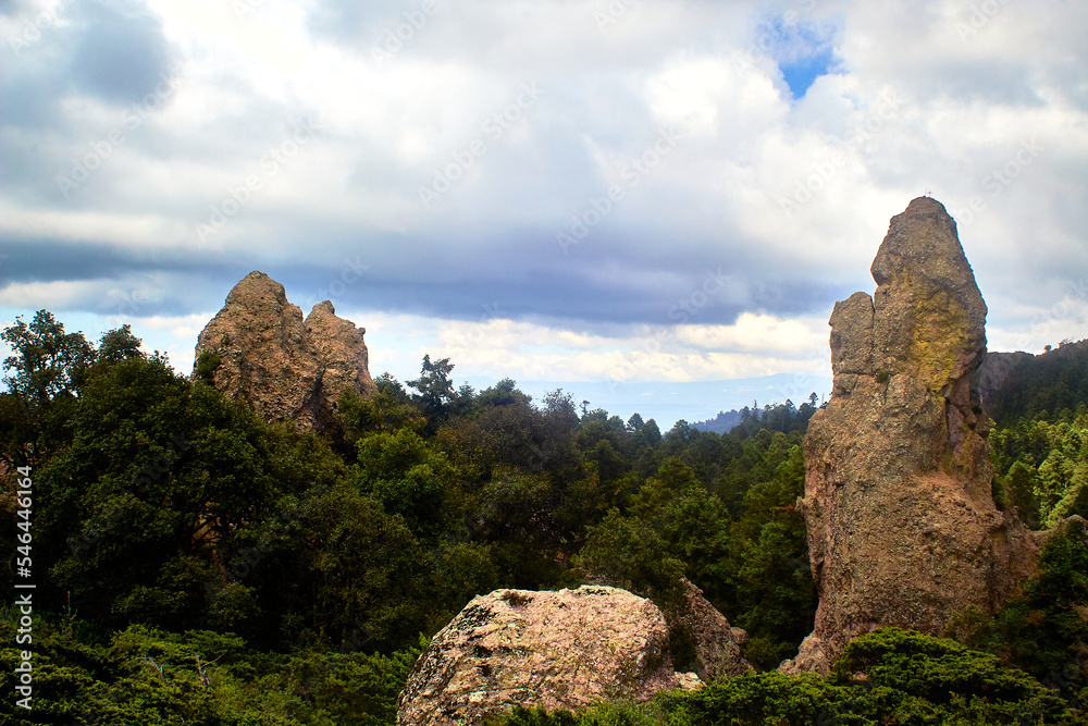 landscape in the woods with big rocks for climbers with sky full of clouds on mineral del chico hidalgo