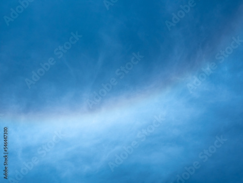 Solar Halo with Rainbow Colors in a Blue Sky
