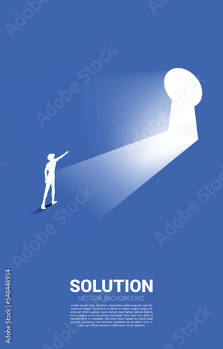 silhouette of businessman point finger to key hole door. Find the solution concept vision mission and goal of business