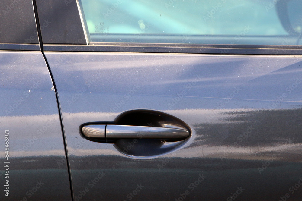 A small fragment of a car body. A small fragment of a car body.
