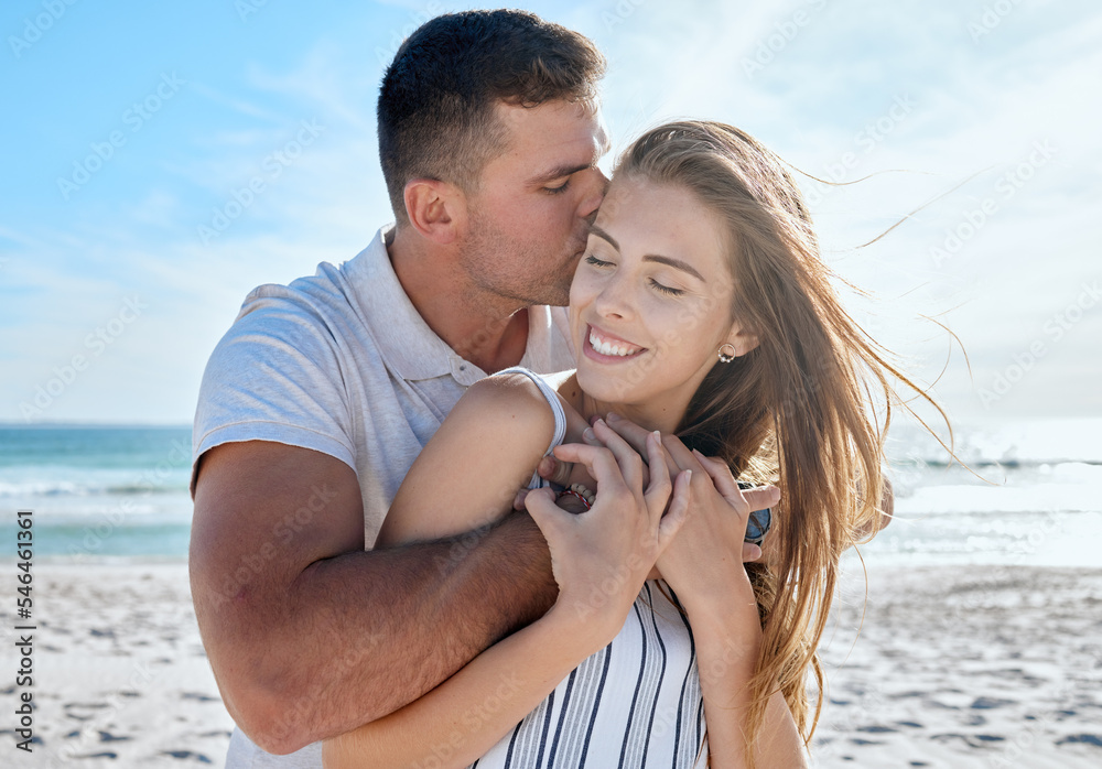 Love, summer and couple hug at the beach enjoying honeymoon, vacation and holiday together. Travel, nature and man and woman embrace, kiss and hugging by ocean for romance, happiness and affection Love, summer and couple hug at the beach enjoying honeymoon, vacation and holiday together. Travel, nature and man and woman embrace, kiss and hugging by ocean for romance, happiness and affection