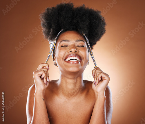 Beauty, hair and afro with black woman and scarf for fashion, luxury and skincare wellness. Smile, health and curly hair with girl model for self love, confidence and empowerment in studio background