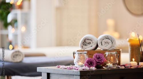 Relax, peace and calm at a luxury spa for wellness, health and zen during a massage. Candles, flowers and healing environment at a salon for stress relief, relaxation and physical therapy on vacation