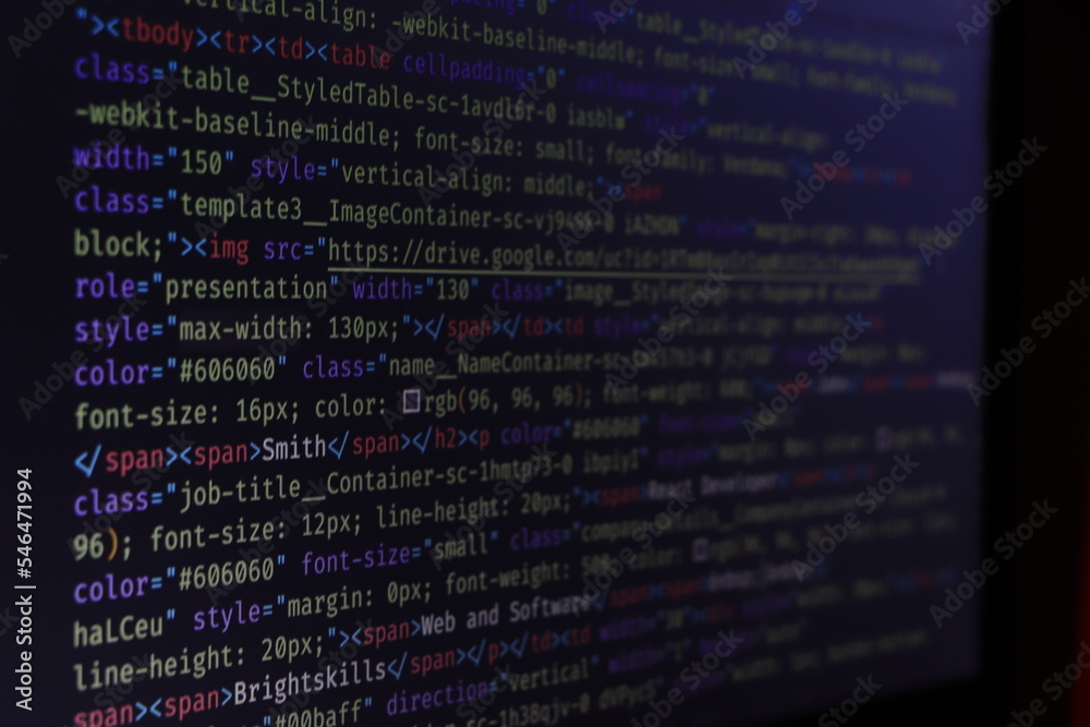 Computer script typing work. Programmer typing new lines of HTML code. Closeup of Java Script, CSS and HTML code. Coding hacker concept. Software source code. Computer script typing work. Programmer typing new lines of HTML code. Closeup of Java Script, CSS and HTML code. Coding hacker concept. Software source code.
