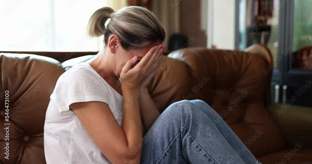 Young female victim suffering from abuse, harassment and depression or heartbreak Young female victim suffering from abuse, harassment and depression or heartbreak