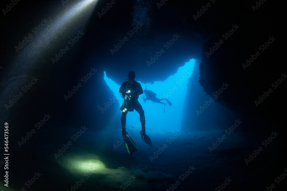 Silhouette view from cave diving